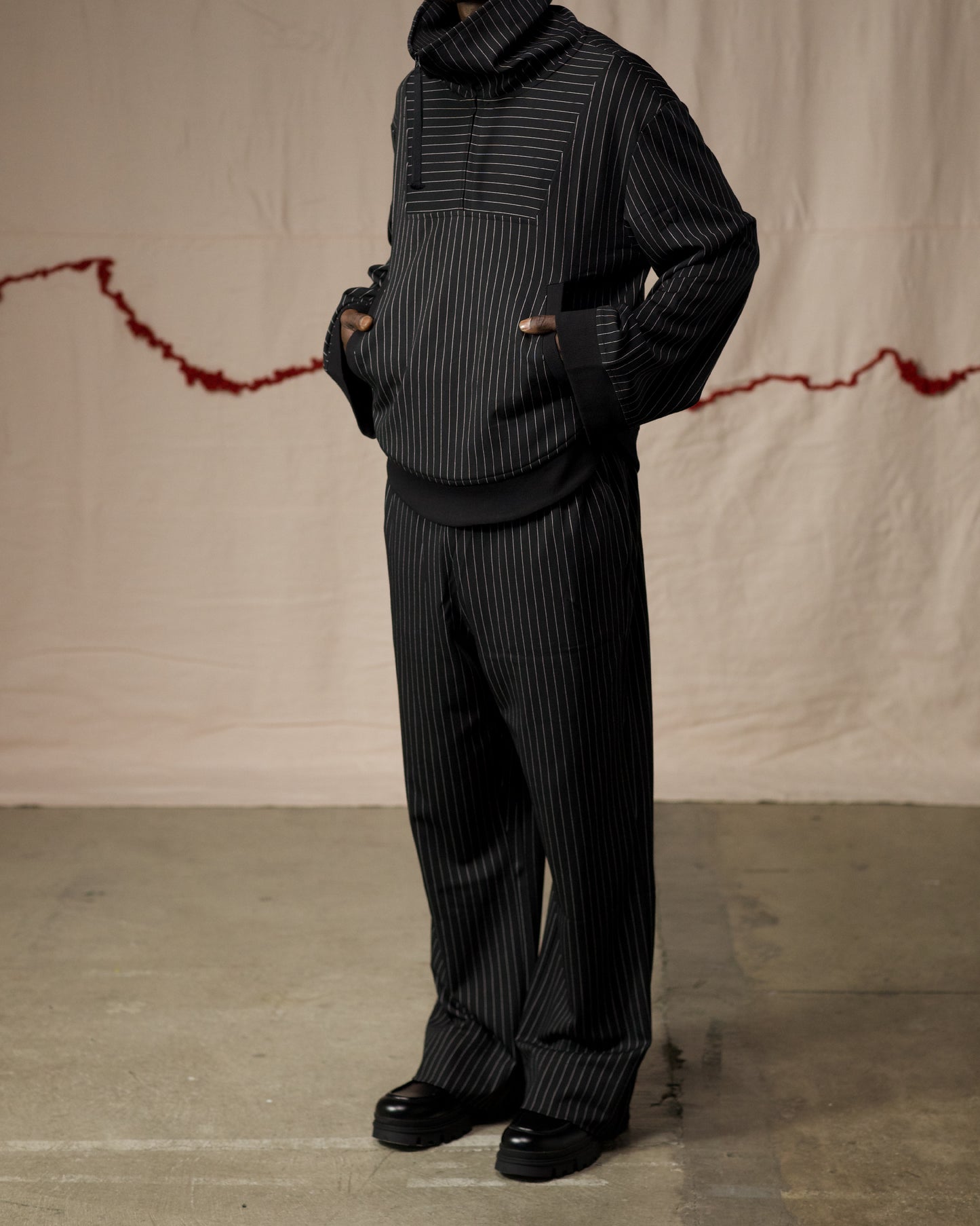 Side View of Model in Pinstripe Medio Pullover by Mind Less