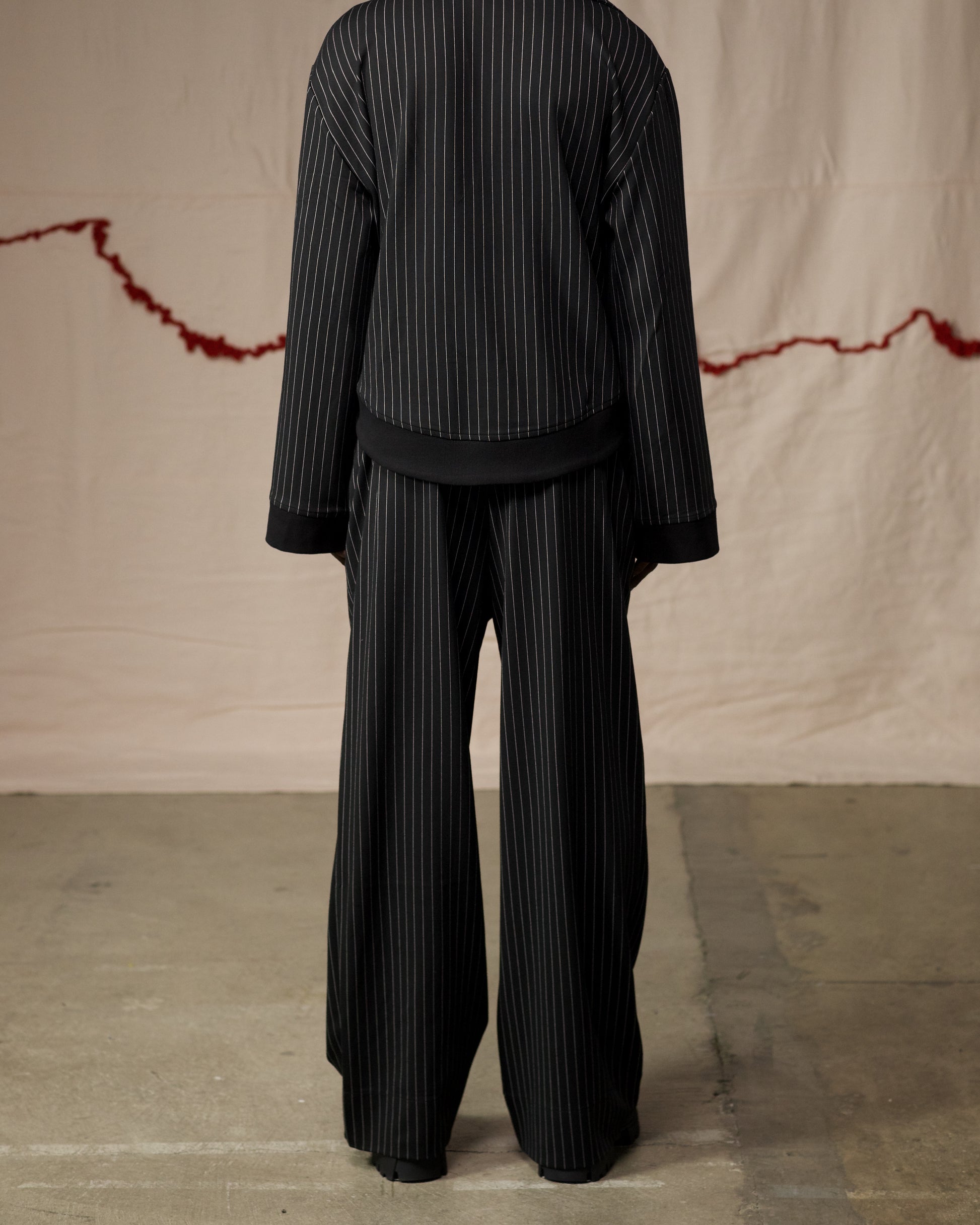 Back View of Model in Pinstripe Medio Pullover by Mind Less