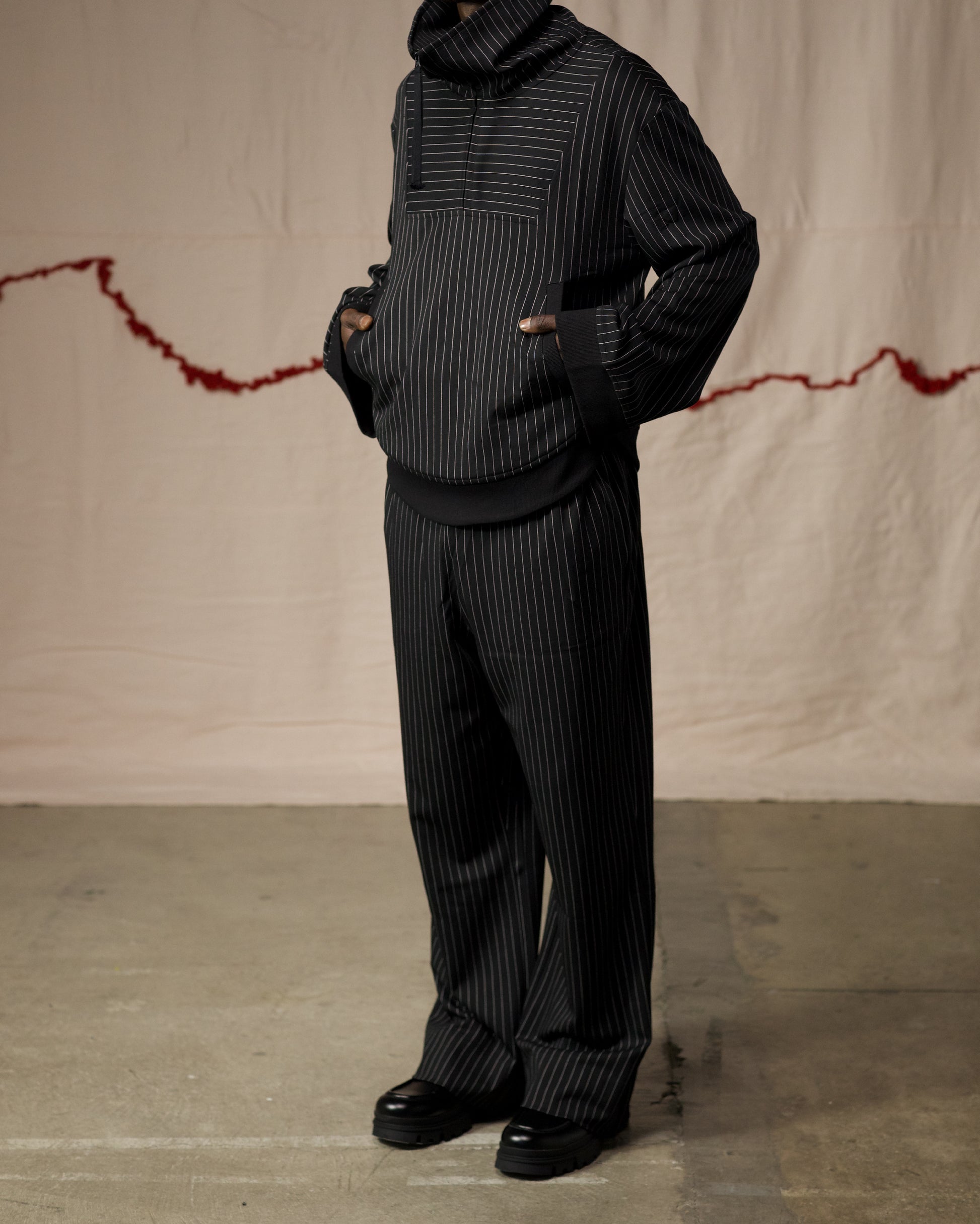 Side View of Model in Pinstripe Medio Pullover by Mind Less