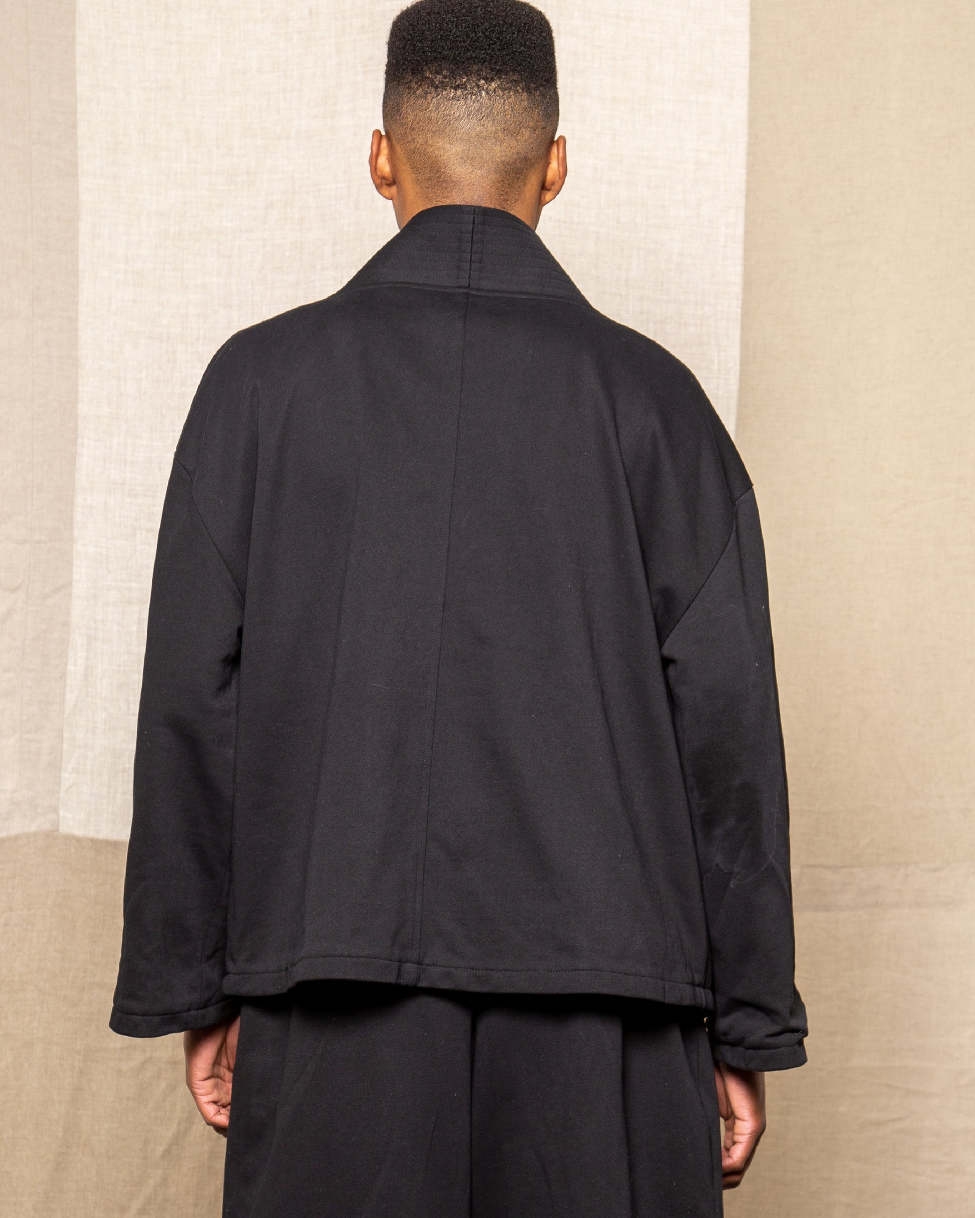 Model is wearing Size Large in Black Shanti Kimono by Mind Less